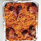 A tray of food with meat and rice

Description automatically generated